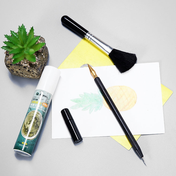Scratch painting tool set: fan brush, gold-tip pen, black stylus, and paint tube