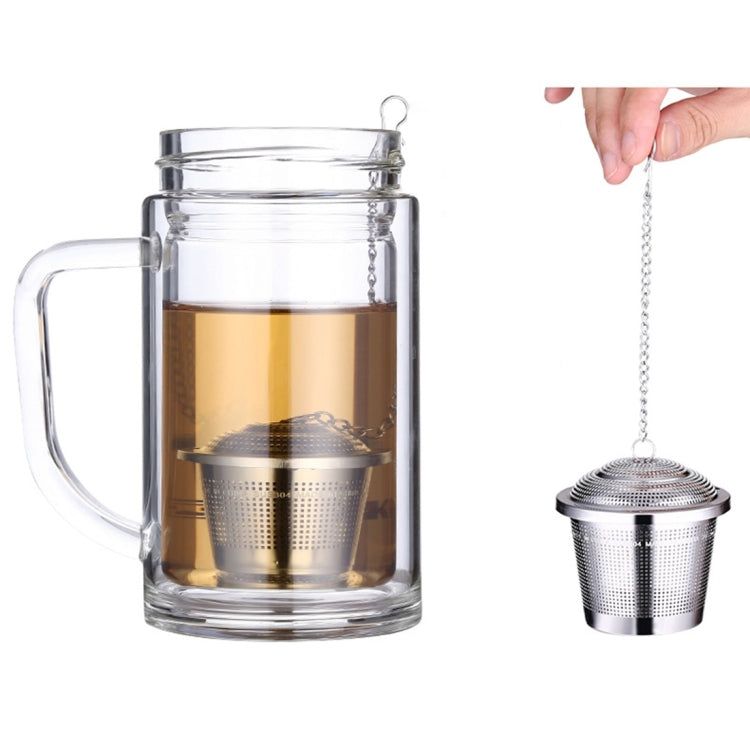 Stainless steel mesh tea infuser with chain, hanging above mug