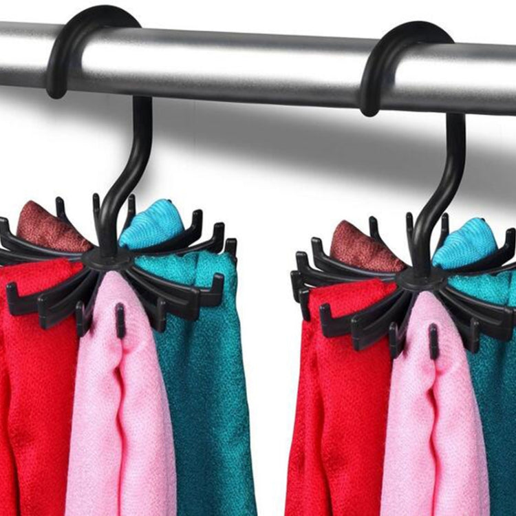 Black 20-claw hangers displaying folded red and turquoise scarves