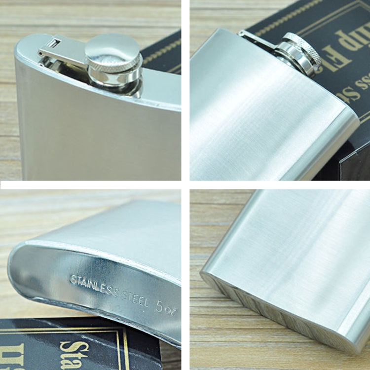 Stainless steel hip flask close-up of flip cap and embossed 5oz marking