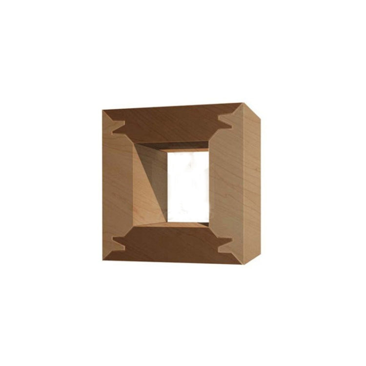 Woodwork sample block showing square stepped tenon recesses for right-angle joinery