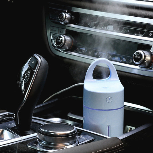 Mini portable USB humidifier, white body with blue LED light, top mist nozzle