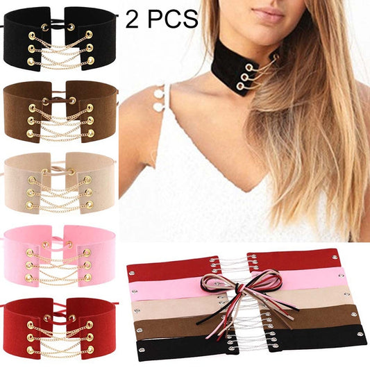 Black velvet ribbon choker collar with gold hardware and layered chain details