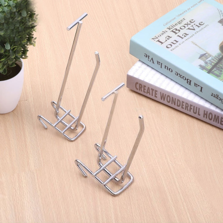 Two silver metal double hooks for wire grid shelves with two-prong hanging arms