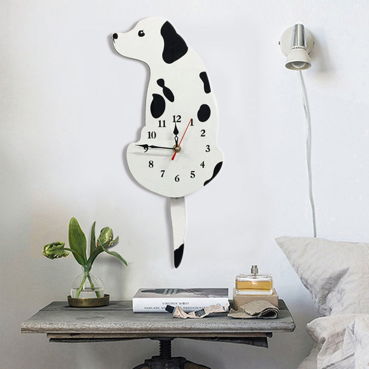 White dog wall clock with black spots, black numerals and red clock hands