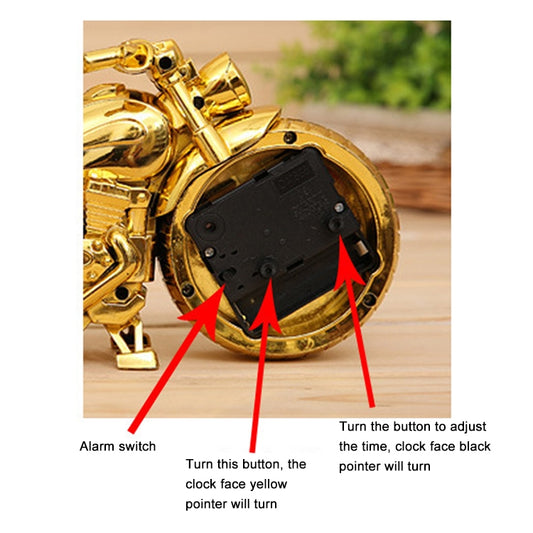 Gold cartoon motorcycle alarm clock back showing alarm switch and time-adjust button