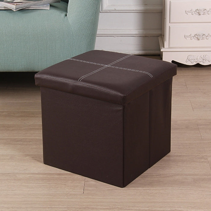 Brown PU leather foldable storage stool with stitched cross pattern on padded top