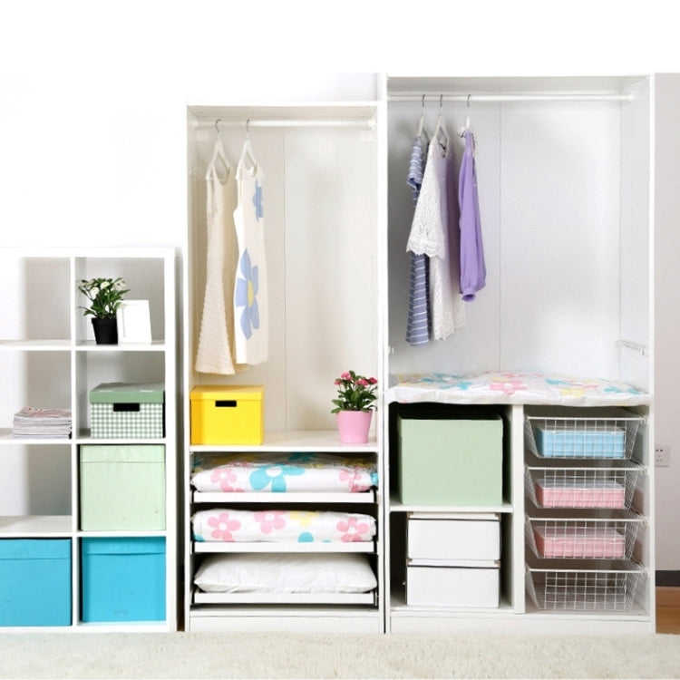 Vacuum storage bag set for folded clothes, arranged in a wardrobe with hanging items