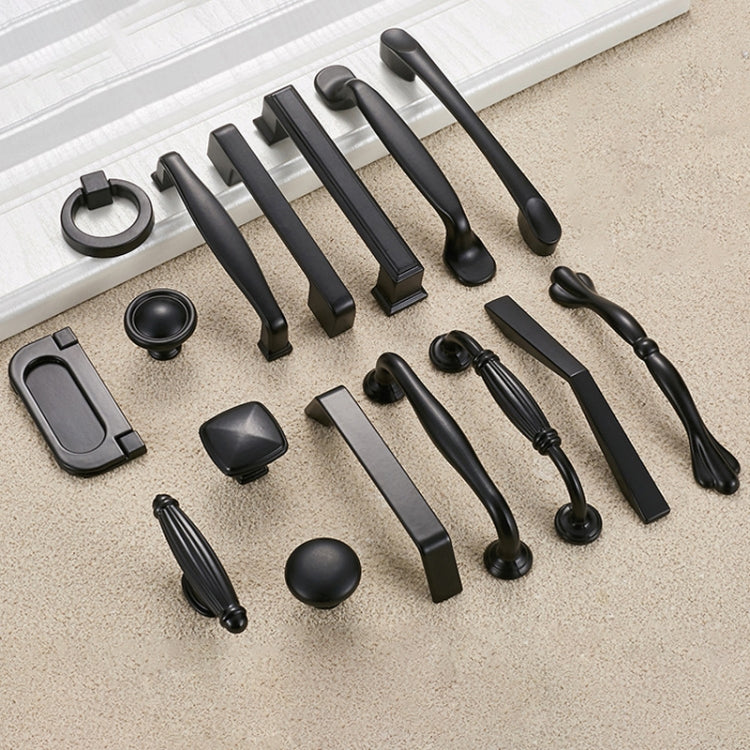 Assorted black cabinet hardware pieces: bar pulls, knobs, and matching accessories