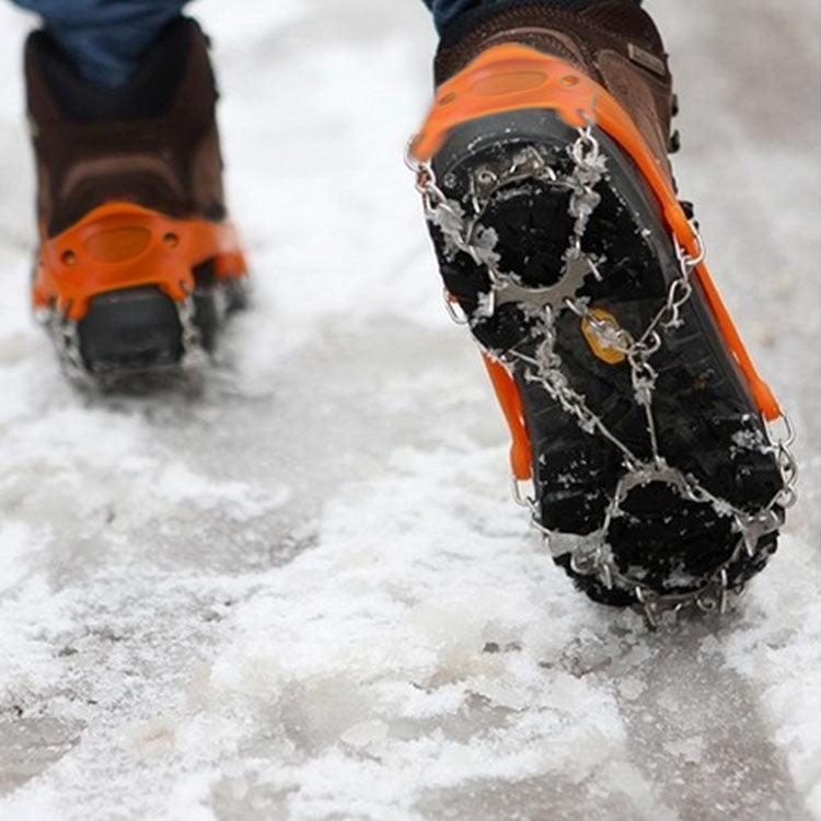 Orange anti-slip ice gripper chain shoe covers with 19-tooth spikes, size M