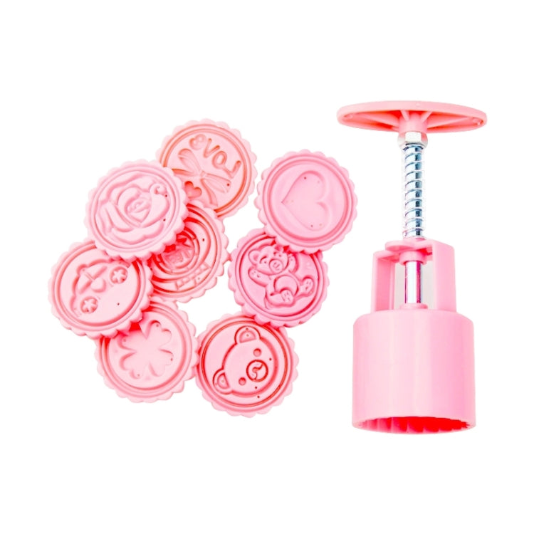 Pink fondant cutter press with 8 round cartoon pattern discs