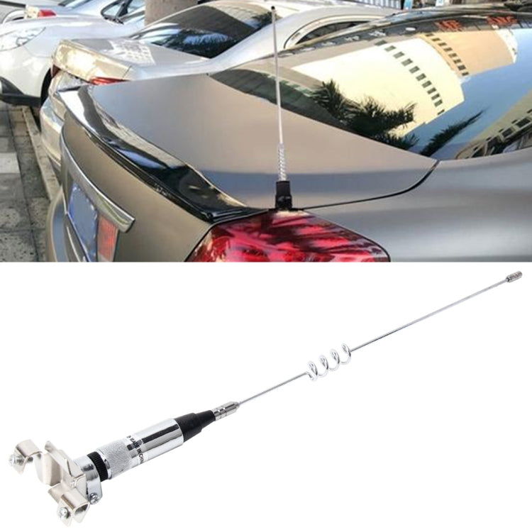 Universal extendable car antenna aerial clip installed on vehicle roof, black whip and coil