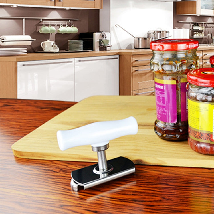 Countertop stainless steel can opener with white handle and black base plate