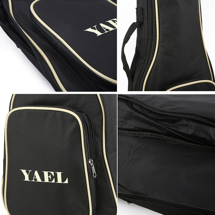 Ukulele gig bag close-up: YAEL logo patch, zippers, and padded black lining.