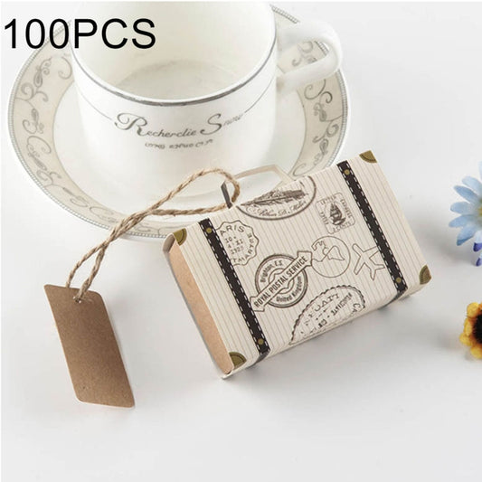 Mini suitcase-shaped favor box with vintage stripes print and tied string tag