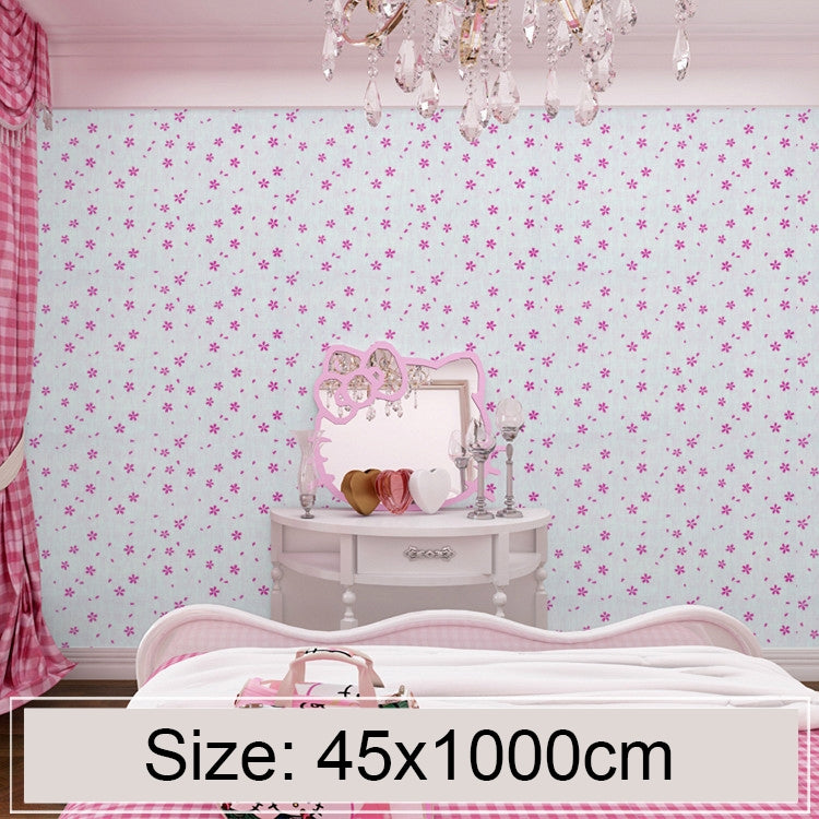 Cherry blossom floral wallpaper with small pink flowers on pale wall, bedroom view