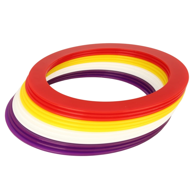 Stack of juggling rings in red, yellow, white, and purple colors
