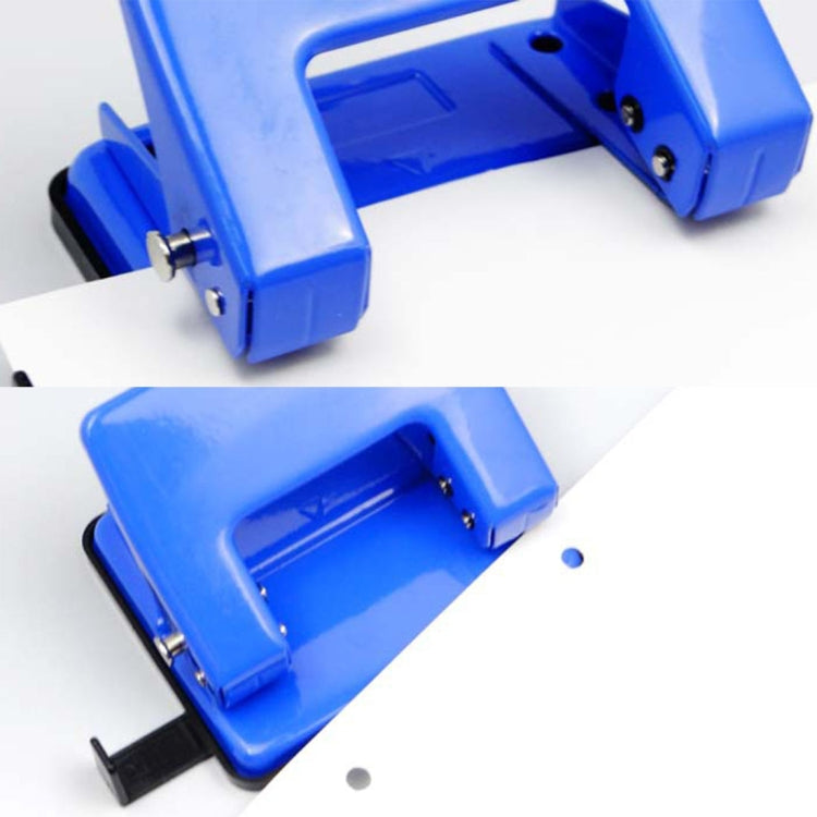 Blue manual double-hole paper punch with metal die and paper hole discs