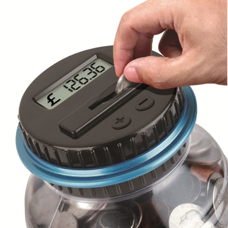 Digital coin bank with LCD screen, buttons, blue rim, clear top; insert coins with £.