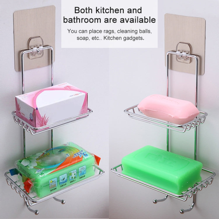 Double-layer soap stand holding pink and green soap bars on two wire trays