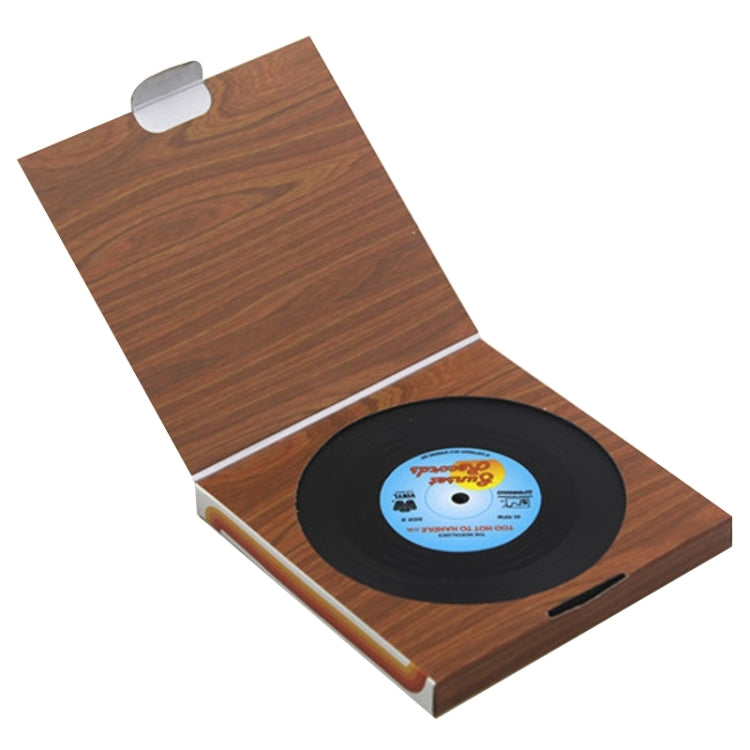 Vinyl record cup coaster set in a wood-texture box, one coaster visible