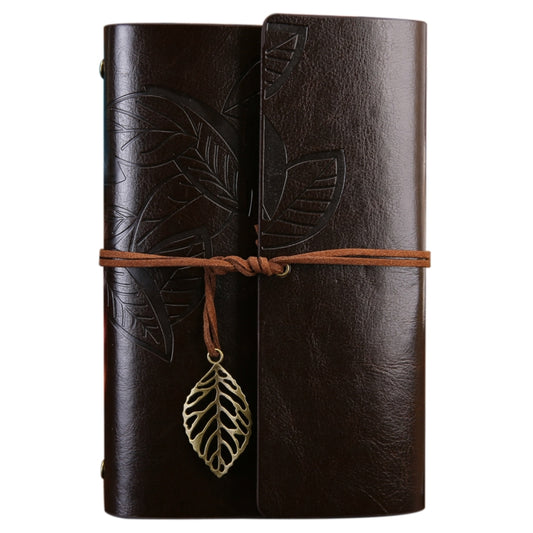 Leather-look travel diary notebook in dark brown with leaf embossed cover and hanging leaf charm