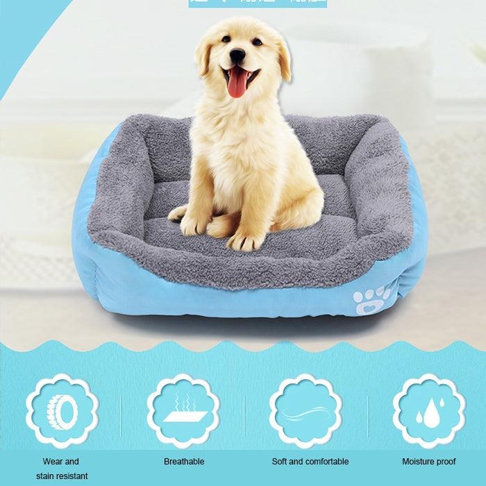 Light blue and gray pet kennel mat with paw emblem, shown with a sitting golden retriever