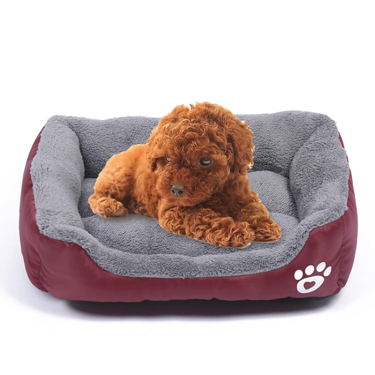 Wine red dog kennel mat with gray plush inner and white paw logo, warm teddy-style bed