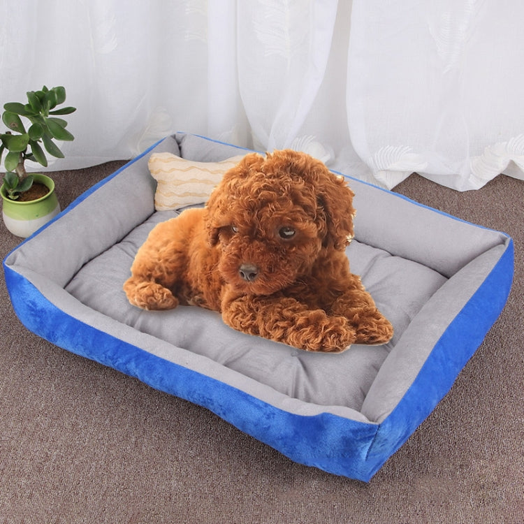 Soft pet kennel mat with gray inner cushion, blue sides, and cream dog-bone pillow