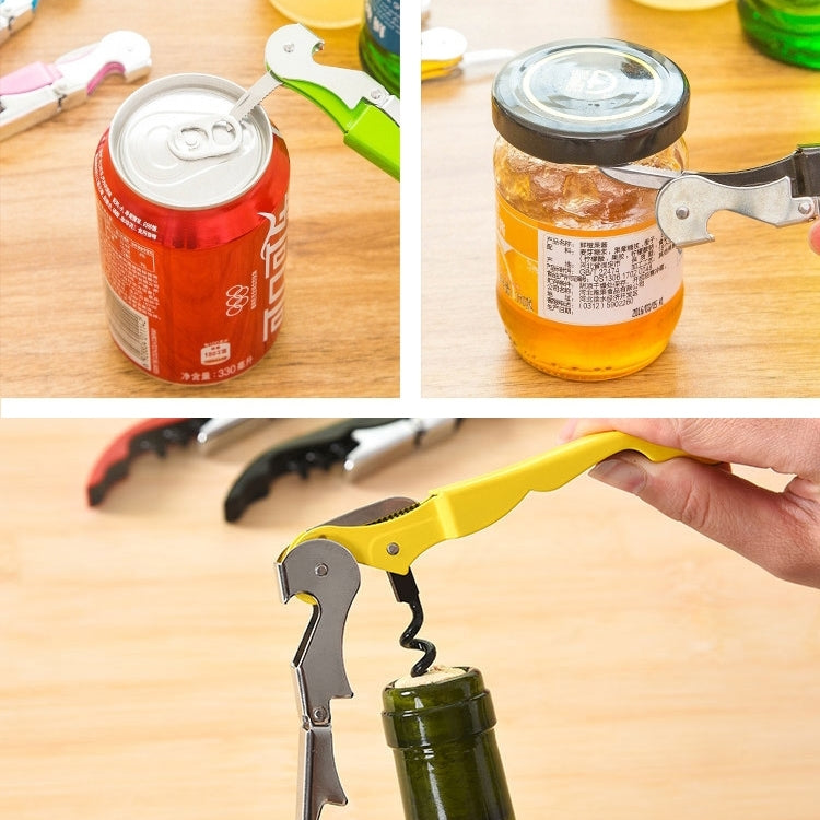 Multi-function opener opening can and jar lids; yellow opener held in hand