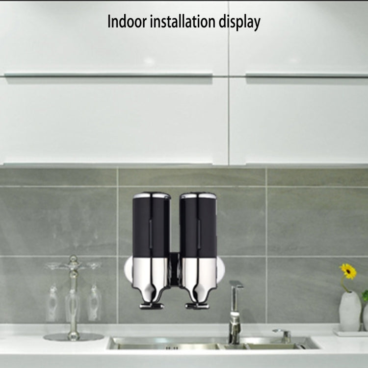 Wall-mounted dual soap dispenser with two chrome reservoirs and spout nozzles