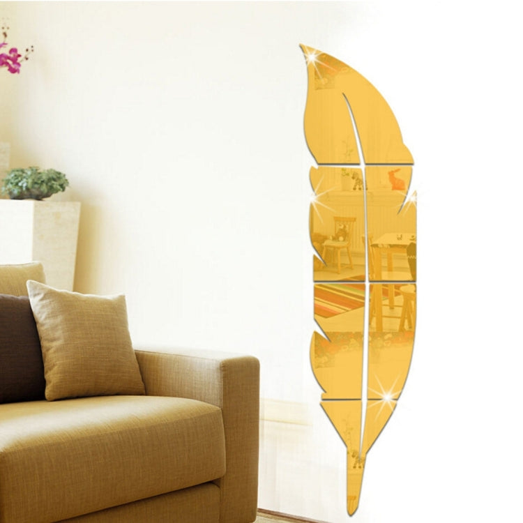 Gold feather mirror wall sticker, tall curved split feather silhouette with shiny reflective sections.