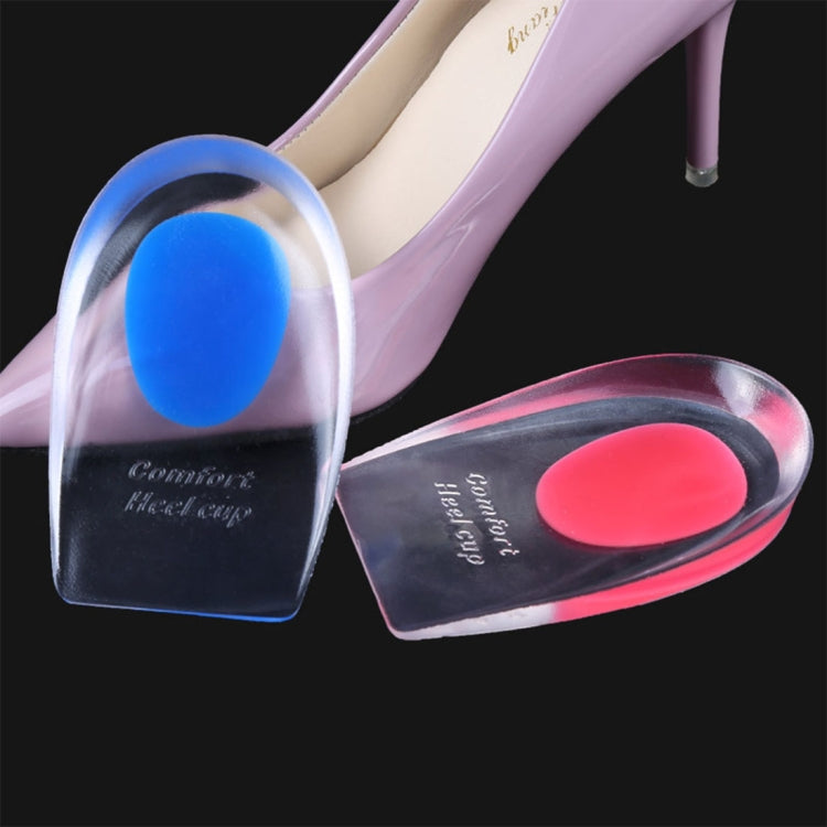 Blue and pink silicone gel half heel cup pads on shoes, one pair