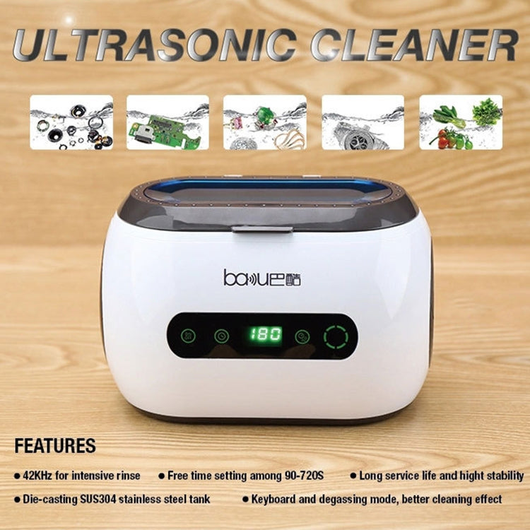 White ultrasonic cleaner with green display lights and blue-tinted lid window