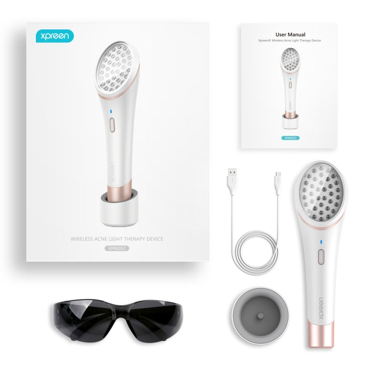 Wireless acne light therapy device kit with user manual, cables, dock base, and glasses