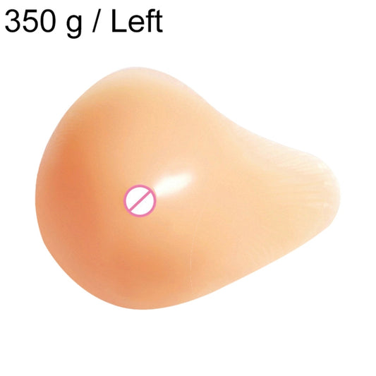 Left silicone breast pad in peach nude, smooth spiral shape with nipple cover