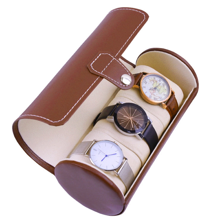 Brown cylindrical watch storage bag with beige lining, holding three watches in slots