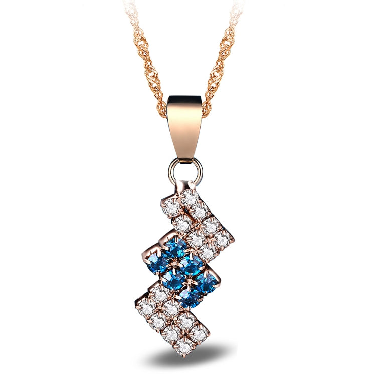 Gold-plated crystal pendant necklace with blue and clear geometric drop