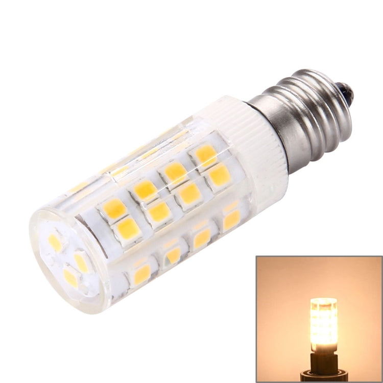 E12 LED bulb with clear body and warm light glow, visible SMD chip array