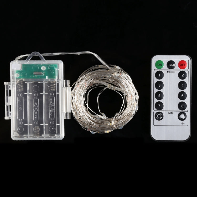 LED fairy light set with clear battery box, coiled wire string, and remote control