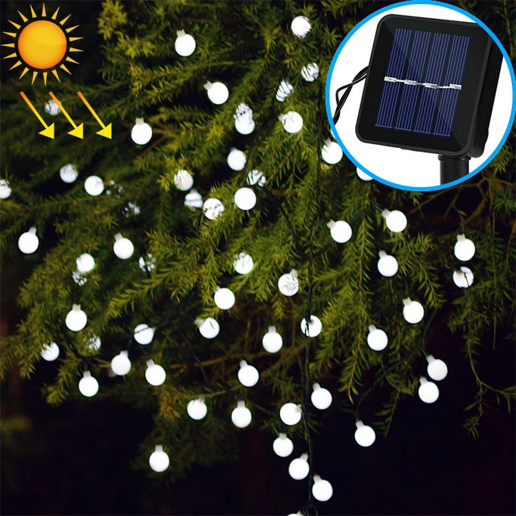 Outdoor solar LED string with round white bulbs and small solar panel
