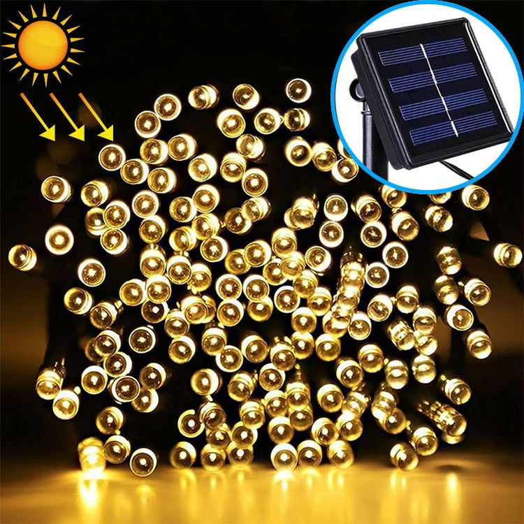 Solar LED string lights with warm golden round bulbs and black solar panel for outdoor use