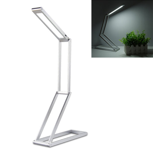 Silver folding LED desk lamp with slim rectangular head and adjustable stand