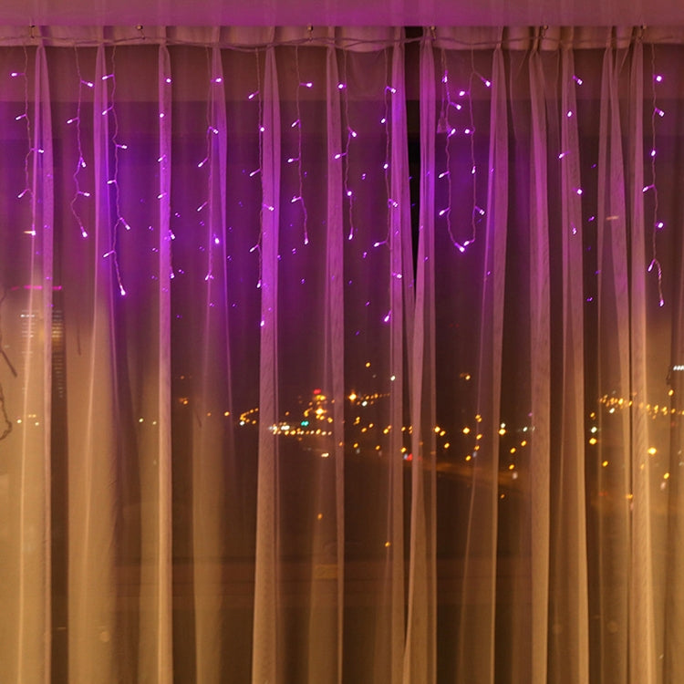 Purple LED ice bar string lights hanging vertically like icicles from a curtain