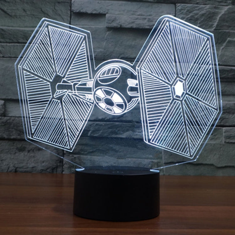 TIE fighter style desk lamp with white-blue neon outline and dark base