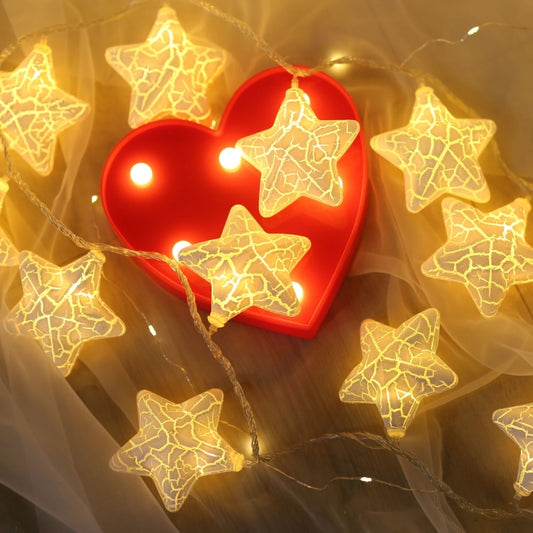 Red heart cracked-star LED fairy lamp with warm glowing star ornaments on wire