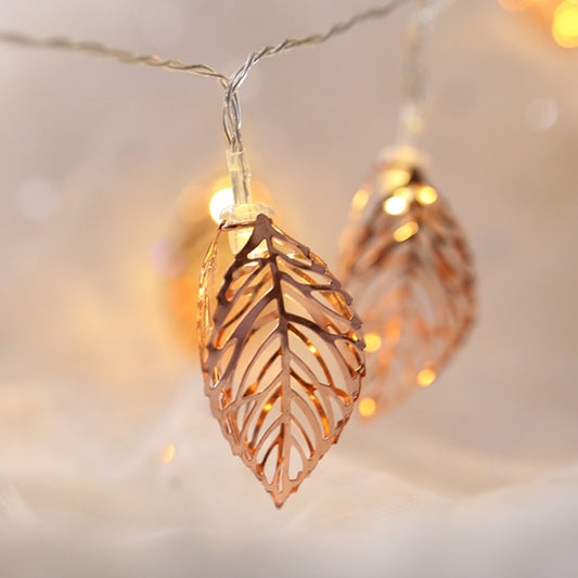 Rose gold leaf fairy string lights with glowing leaf bulb on silver wire