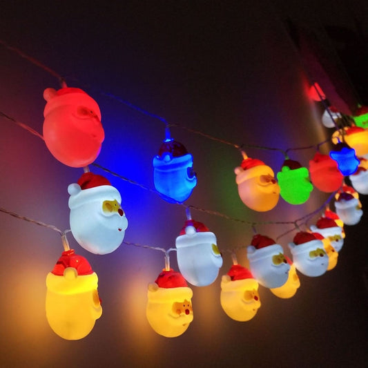 Multicolor LED string lights with hanging Santa and snowman figures indoors
