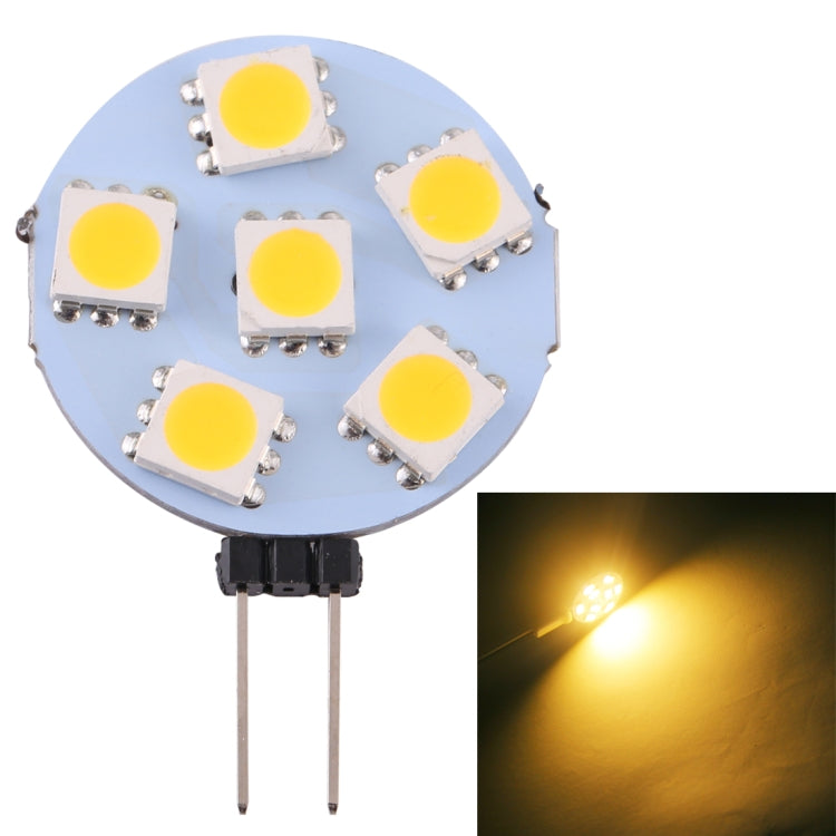 G4 LED bulb with 6 SMD LEDs and two pin leads, showing warm light glow