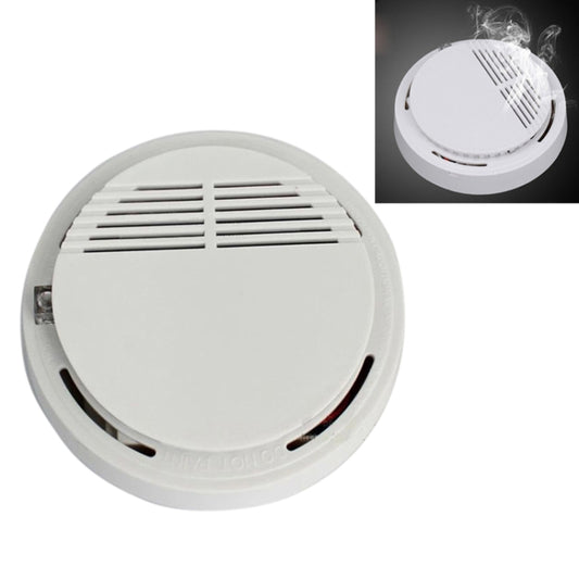 Battery-powered smoke alarm, white circular housing with top speaker grille.